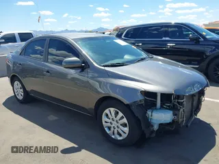 2013 Kia Forte EX with VIN KNAFU4A27D5724120, listed as a IAAI auction lot 42153084 with 154,860 mi miles. Bid and sale history available at carsss.com. Image 1.