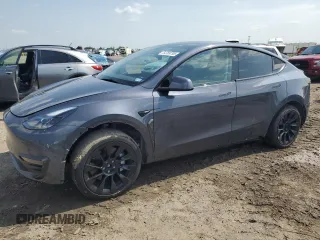 2023 Tesla Model Y Long Range z VIN 7SAYGAEE5PF969011, wystawiony jako Copart lot #54769795 z przebiegiem 22 402 mil mil oraz Szkoda całkowita • Salvage title. Historia ofert i sprzedaży dostępna na DreamBid. Obrazek 1.