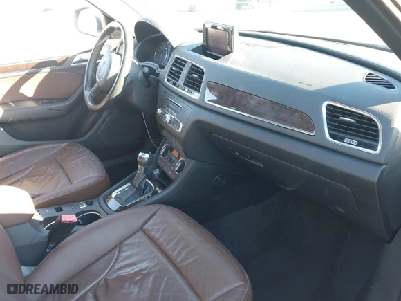 2016 Audi Q3 Premium Plus with VIN WA1BFCFSXGR014778, listed as a IAAI auction lot 41285863 with 73,044 mi miles. Bid and sale history available at carsss.com. Image 5.