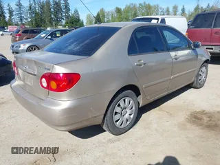 2004 Toyota Corolla CE with VIN 1NXBR32E24Z288154, listed as a IAAI auction lot 42073969 with 226,820 mi miles. Bid and sale history available at carsss.com. Image 4.