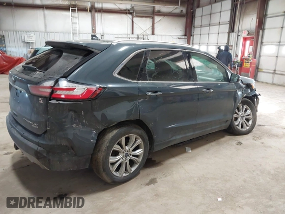 2019 Ford Edge Titanium with VIN 2FMPK4K93KBB01364, listed as a IAAI auction lot 41286263 with 134,588 mi miles. Bid and sale history available at carsss.com. Image 4.