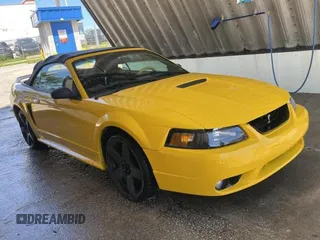 1999 Ford Mustang GT z VIN 1FAFP45X7XF114772, wystawiony jako Copart lot #56733905 z przebiegiem 233 015 mil mil oraz Czysty tytuł • Clean title. Historia ofert i sprzedaży dostępna na DreamBid. Obrazek 1.