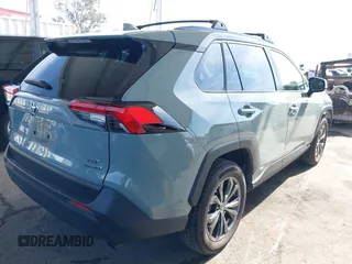 2023 Toyota RAV4 Hybrid XLE Premium with VIN JTMB6RFV8PD086983, listed as a IAAI auction lot 41612674 with 70,817 mi miles. Bid and sale history available at carsss.com. Image 4.