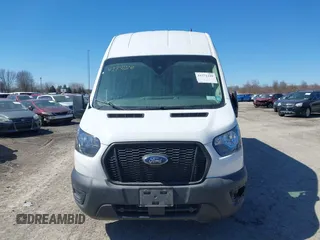 2022 Ford Transit Cargo z VIN 1FTBR3X8XNKA71066, wystawiony jako IAAI lot #41771120 z przebiegiem 87 702 mil mil oraz . Historia ofert i sprzedaży dostępna na DreamBid. Obrazek 11.