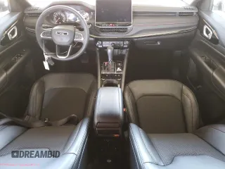 2025 Jeep Compass Trailhawk with VIN 3C4NJDDN3ST557667, listed as a Copart auction lot 65611635 with 8,984 mi miles and Clean title. Bid and sale history available at DreamBid. Image 8.