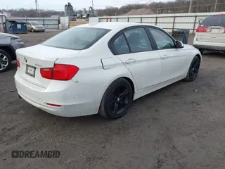 2013 BMW 3 Series 328i xDrive with VIN WBA3B5G5XDNS02162, listed as a IAAI auction lot 41484578 with 132,211 mi miles. Bid and sale history available at carsss.com. Image 4.