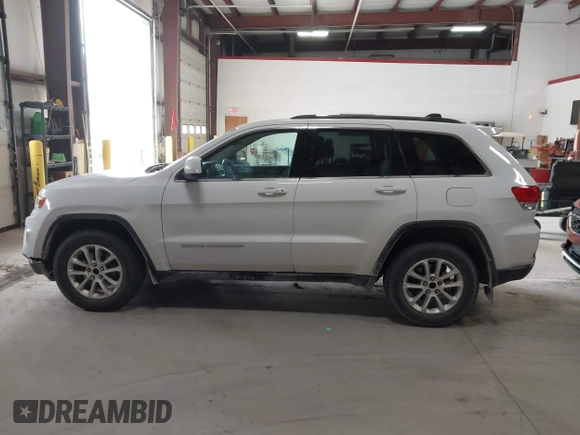 2014 Jeep Grand Cherokee Laredo with VIN 1C4RJFAG4EC309401, listed as a IAAI auction lot 41996233 with 243,541 mi miles and . Bid and sale history available at DreamBid. Image 14.
