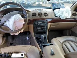 1999 Chrysler 300M M z VIN 2C3HE66G3XH577241, wystawiony jako Copart lot #39567584 z przebiegiem Nie podano mil oraz Nie do naprawy • Non repairable. Historia ofert i sprzedaży dostępna na DreamBid. Obrazek 8.