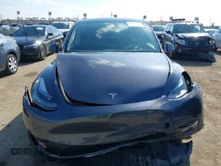 2023 Tesla Model Y Performance with VIN 7SAYGDEF5PF823122, listed as a IAAI auction lot 41546480 with 12,943 mi miles and . Bid and sale history available at DreamBid. Image 11.