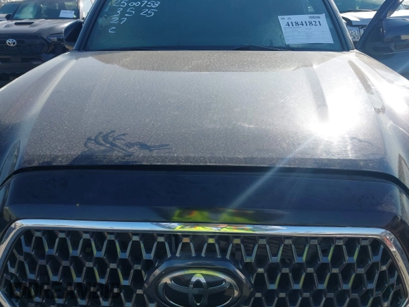 2019 Toyota Tacoma SR z VIN 5TFCZ5AN9KX199814, wystawiony jako IAAI lot #41841821 z przebiegiem 69 276 mil mil oraz . Historia ofert i sprzedaży dostępna na DreamBid. Obrazek 10.