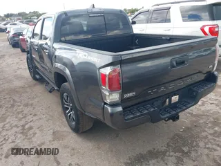 2022 Toyota Tacoma SR5 with VIN 3TMAZ5CN6NM186713, listed as a IAAI auction lot 42607719 with 60,704 mi miles and . Bid and sale history available at DreamBid. Image 3.