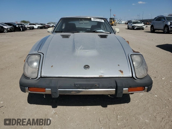 1981 Datsun 280ZX z VIN JN1HZ04S2BX413331, wystawiony jako Copart lot #50431235 z przebiegiem 98 237 mil mil oraz Tytuł czysty. Historia ofert i sprzedaży dostępna na DreamBid. Obrazek 5.