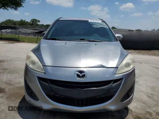 2014 Mazda 5 Sport z VIN JM1CW2BL0E0170901, wystawiony jako Copart lot #57829555 z przebiegiem 102 210 mil mil oraz Szkoda całkowita • Salvage title. Historia ofert i sprzedaży dostępna na DreamBid. Obrazek 5.