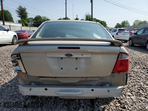 2006 Ford Focus S z VIN 1FAFP34N96W111431, wystawiony jako Copart lot #59478815 z przebiegiem Nie podano mil oraz Szkoda całkowita • Salvage title. Historia ofert i sprzedaży dostępna na DreamBid. Obrazek 6.