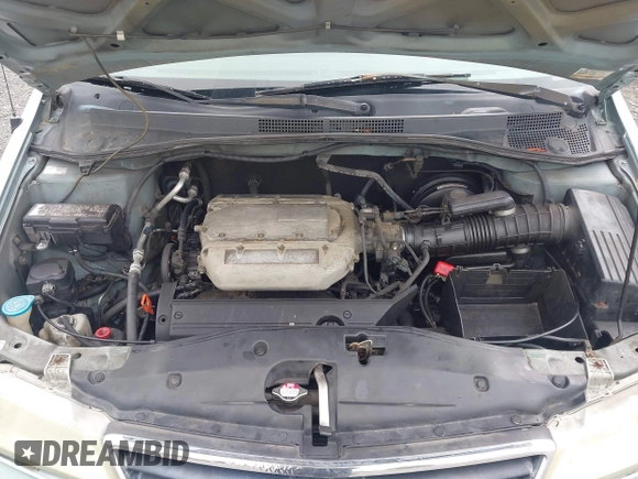 2004 Honda Odyssey EX-L with VIN 5FNRL18974B036430, listed as a IAAI auction lot 42715287 with 230,646 mi miles and . Bid and sale history available at DreamBid. Image 10.
