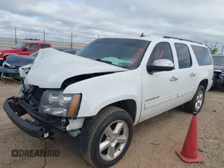 2014 Chevrolet Suburban LT with VIN 1GNSCJE02ER135926, listed as a IAAI auction lot 40675403 with 240,683 mi miles. Bid and sale history available at carsss.com. Image 2.