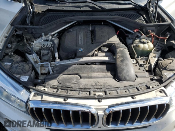 2018 BMW X5 xDrive35i with VIN 5UXKR0C53J0X93705, listed as a Copart auction lot 51715435 with 106,677 mi miles and Salvage Title. Bid and sale history available at carsss.com. Image 12.