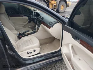 2013 Volkswagen Passat SEL Premium with VIN 1VWCM7A3XDC132834, listed as a IAAI auction lot 40931506 with 146,283 mi miles. Bid and sale history available at carsss.com. Image 5.