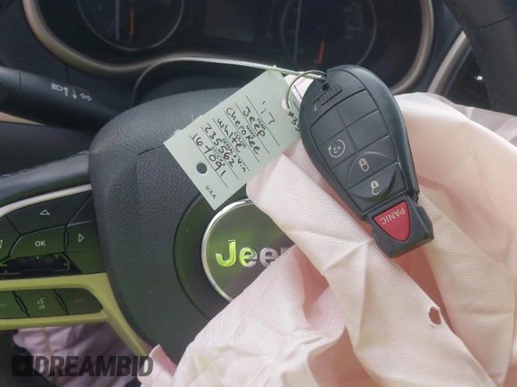 2017 Jeep Cherokee Latitude with VIN 1C4PJMCS3HD235562, listed as a IAAI auction lot 42203685 with 61,055 mi miles and . Bid and sale history available at DreamBid. Image 11.
