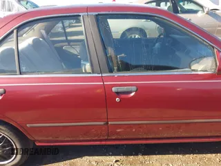 1996 Nissan Sentra XE z VIN 1N4AB41D7TC770549, wystawiony jako IAAI lot #41160561 z przebiegiem 180 485 mil mil oraz . Historia ofert i sprzedaży dostępna na DreamBid. Obrazek 13.