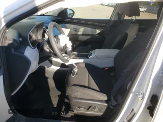 2024 Hyundai Tucson SEL with VIN 5NMJBCDE1RH353642, listed as a Copart auction lot 77195424 with 15,911 mi miles and Salvage Title. Bid and sale history available at carsss.com. Image 7.