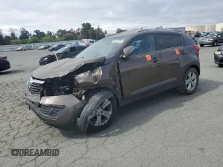 2011 Kia Sportage LX with VIN KNDPB3A27B7063214, listed as a Copart auction lot 66228395 with Not provided miles and Salvage title. Bid and sale history available at DreamBid. Image 1.