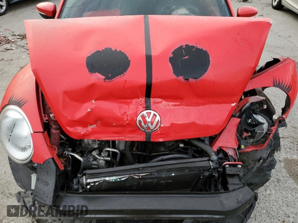 2013 Volkswagen Beetle with VIN 3VWHX7AT8DM604332, listed as a Copart auction lot 79781264 with 125,692 mi miles and Salvage Title. Bid and sale history available at DreamBid. Image 12.