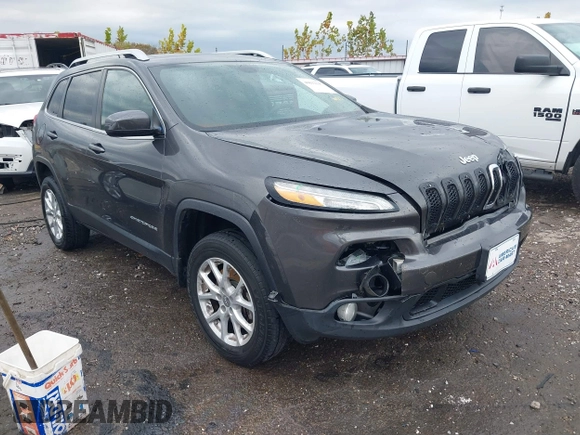 2014 Jeep Cherokee Altitude with VIN 1C4PJMCB7EW232678, listed as a IAAI auction lot 40812147 with 105,828 mi miles. Bid and sale history available at carsss.com. Image 1.