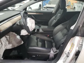 2021 Tesla Model 3 Standard Range Plus z VIN 5YJ3E1EA4MF988784, wystawiony jako Copart lot #88138765 z przebiegiem 62 438 mil mil oraz Szkody całkowita. Historia ofert i sprzedaży dostępna na DreamBid. Obrazek 7.