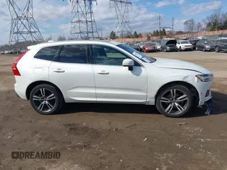 2019 Volvo XC60 Momentum with VIN LYV102RK9KB206928, listed as a IAAI auction lot 41673598 with 25,512 mi miles and . Bid and sale history available at DreamBid. Image 14.