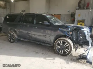 2020 Chevrolet Suburban Premier with VIN 1GNSKJKC7LR260712, listed as a Copart auction lot 45526885 with 94,786 mi miles and Salvage Title. Bid and sale history available at carsss.com. Image 4.