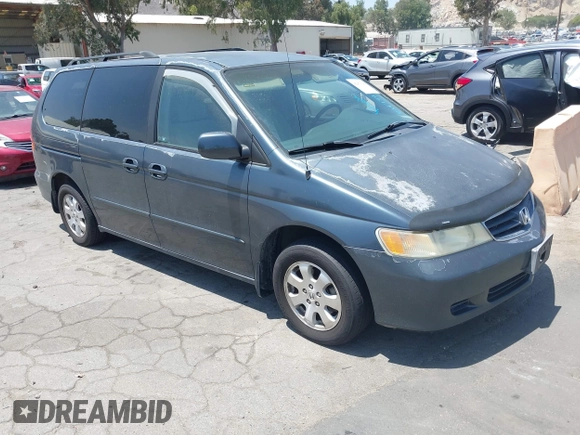 2003 Honda Odyssey EX z VIN 5FNRL18683B097760, wystawiony jako IAAI lot #42479209 z przebiegiem 126 470 mil mil oraz . Historia ofert i sprzedaży dostępna na DreamBid. Obrazek 1.