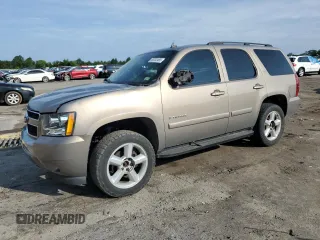 2007 Chevrolet Tahoe LT with VIN 1GNFK13047J166104, listed as a Copart auction lot 65332465 with 132,526 mi miles and Salvage title. Bid and sale history available at DreamBid. Image 1.