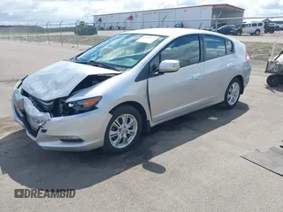 2010 Honda Insight EX with VIN JHMZE2H71AS017996, listed as a IAAI auction lot 42091356 with 142,474 mi miles and . Bid and sale history available at DreamBid. Image 18.
