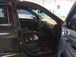 2015 Jeep Grand Cherokee Limited with VIN 1C4RJFBG4FC611156, listed as a IAAI auction lot 42021705 with 137,887 mi miles. Bid and sale history available at carsss.com. Image 5.