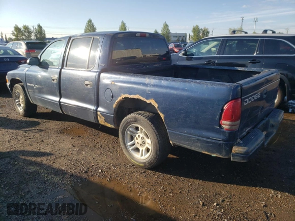 2001 Dodge Dakota Sport z VIN 1B7HL2AN51S225570, wystawiony jako Copart lot #66186174 z przebiegiem 295 142 mil mil oraz Szkoda całkowita • Salvage title. Historia ofert i sprzedaży dostępna na DreamBid. Obrazek 2.