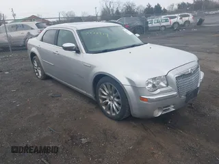 2009 Chrysler 300 with VIN 2C3LA63T89H622085, listed as a IAAI auction lot 41872519 with 151,543 mi miles. Bid and sale history available at carsss.com. Image 1.