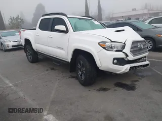 2016 Toyota Tacoma SR with VIN 3TMCZ5AN0GM030469, listed as a IAAI auction lot 41665255 with 178,591 mi miles. Bid and sale history available at carsss.com. Image 1.