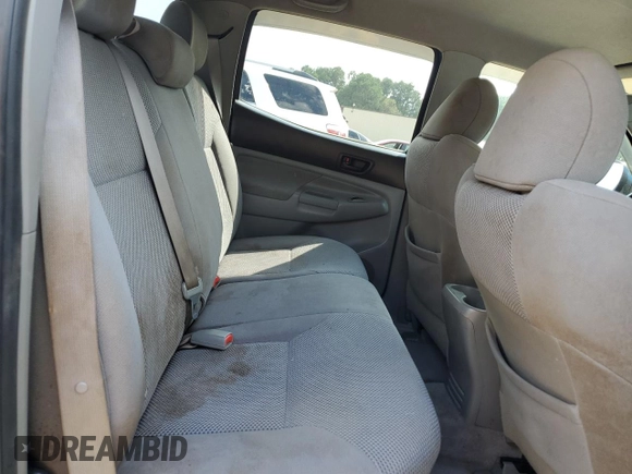 2009 Toyota Tacoma with VIN 3TMLU42N39M021727, listed as a Copart auction lot 65031095 with 200,386 mi miles and Salvage title. Bid and sale history available at DreamBid. Image 10.