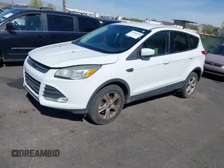 2013 Ford Escape SE with VIN 1FMCU9GX8DUA42581, listed as a IAAI auction lot 42088045 with 153,145 mi miles. Bid and sale history available at carsss.com. Image 2.