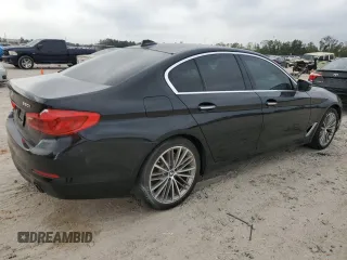 2018 BMW 5 Series 530i with VIN WBAJA5C54JG899845, listed as a Copart auction lot 83007584 with 57,379 mi miles and Salvage Title. Bid and sale history available at DreamBid. Image 3.