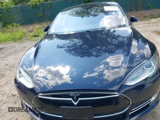 2013 Tesla Model S with VIN 5YJSA1CN0DFP21851, listed as a IAAI auction lot 42557791 with 106,328 mi miles and . Bid and sale history available at DreamBid. Image 6.