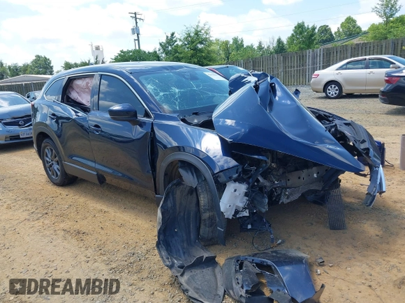 2022 Mazda CX-9 Touring z VIN JM3TCBCY7N0600370, wystawiony jako IAAI lot #42658049 z przebiegiem 113 000 mil mil oraz . Historia ofert i sprzedaży dostępna na DreamBid. Obrazek 1.