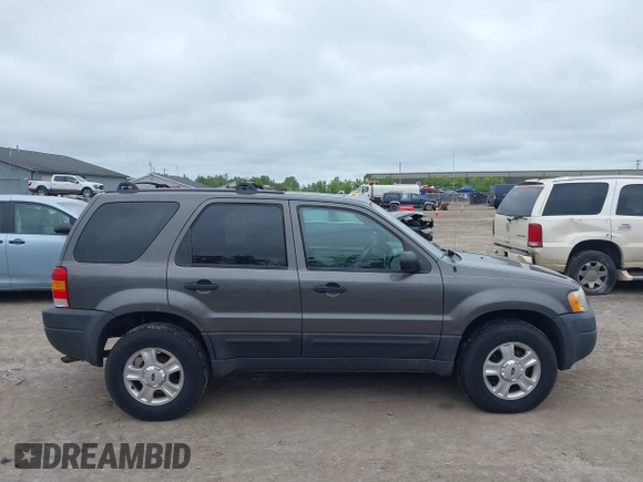 2004 Ford Escape XLT z VIN 1FMCU931X4DA18154, wystawiony jako IAAI lot #42364169 z przebiegiem 173 391 mil mil oraz . Historia ofert i sprzedaży dostępna na DreamBid. Obrazek 13.