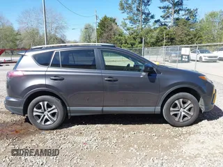 2016 Toyota RAV4 LE with VIN JTMZFREV5GJ078051, listed as a IAAI auction lot 41858381 with 97,032 mi miles and . Bid and sale history available at DreamBid. Image 13.