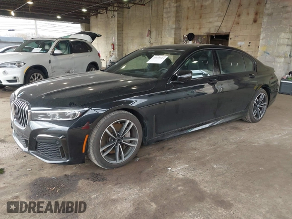 2020 BMW 7 Series 750i xDrive with VIN WBA7U2C02LGJ59475, listed as a IAAI auction lot 41975021 with 52,818 mi miles and . Bid and sale history available at carsss.com. Image 2.