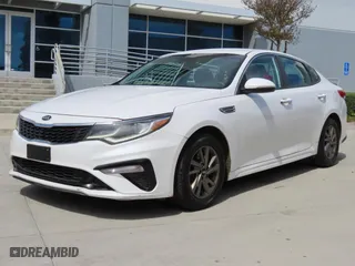 2019 Kia Optima LX with VIN 5XXGT4L36KG329998, listed as a Copart auction lot 52011715 with 123,942 mi miles and Salvage Title. Bid and sale history available at carsss.com. Image 2.