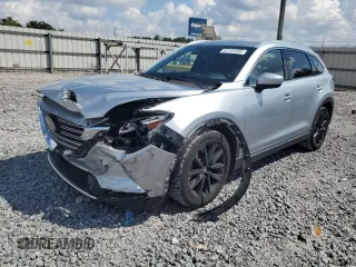 2016 Mazda CX-9 Grand Touring с VIN JM3TCADY8G0122231, выставлен на аукционе Copart как лот 63101505 с пробегом 98 920 миль миль и Списание • Salvage title. История ставок и продаж доступна на DreamBid. Изображение 1.
