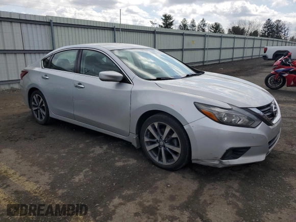 2017 Nissan Altima SR with VIN 1N4AL3AP5HN326955, listed as a Copart auction lot 51273575 with 91,084 mi miles and Salvage Title. Bid and sale history available at DreamBid. Image 4.