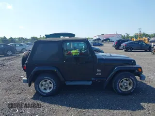 2003 Jeep Wrangler Sahara with VIN 1J4FA59S23P328003, listed as a IAAI auction lot 42833276 with 271,741 mi miles and . Bid and sale history available at DreamBid. Image 13.